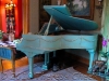 embellished piano with glazing and gilding