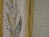 detail of custom painted mirror frame